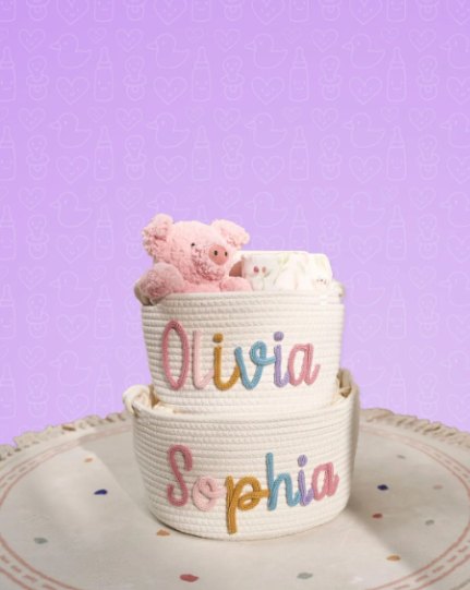 Two stacked baskets with the names Olivia and Sophia
